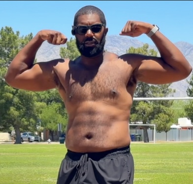 KMOS after rebuilding his health and discipline—replace with a specific description of this photo.
